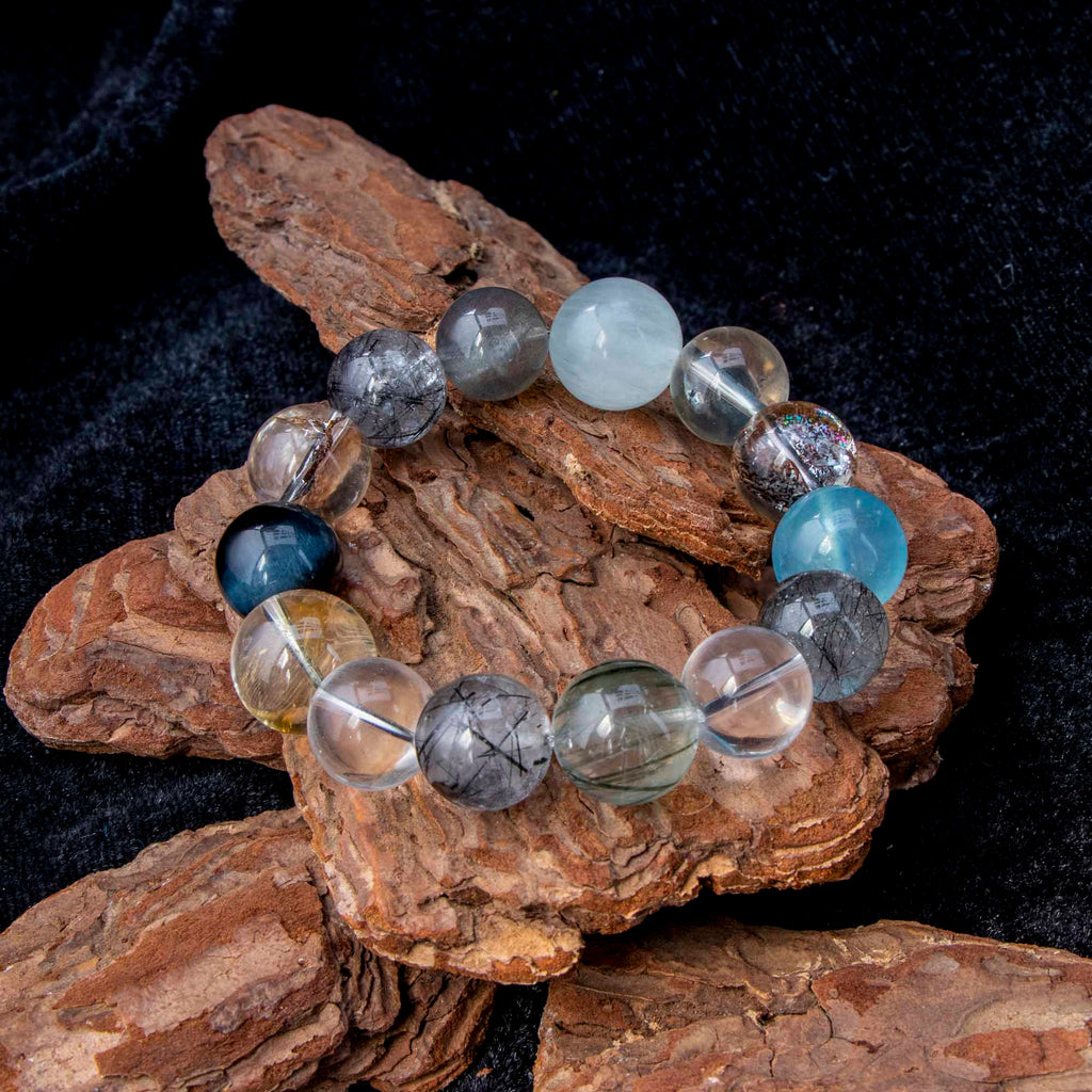 Auralyn Tarot The Chariot Growth & Flow Crystal Bracelet, 13–15mm Green & Black Rutilated Quartz with Clear Quartz, Gold-Foil Flower Agate, White Phantom, Aquamarine & Blue Tiger Eye, Handmade