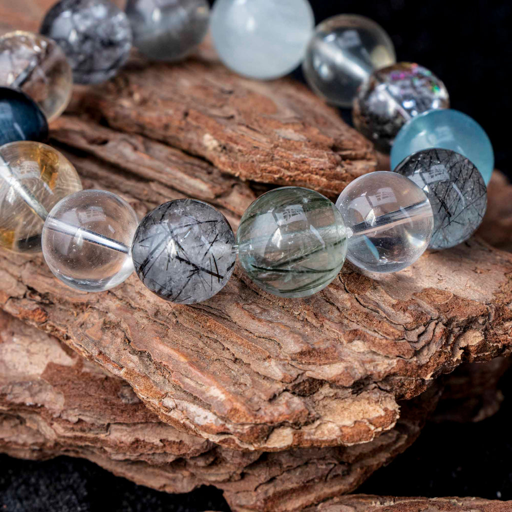 Auralyn Tarot The Chariot Growth & Flow Crystal Bracelet, 13–15mm Green & Black Rutilated Quartz with Clear Quartz, Gold-Foil Flower Agate, White Phantom, Aquamarine & Blue Tiger Eye, Handmade