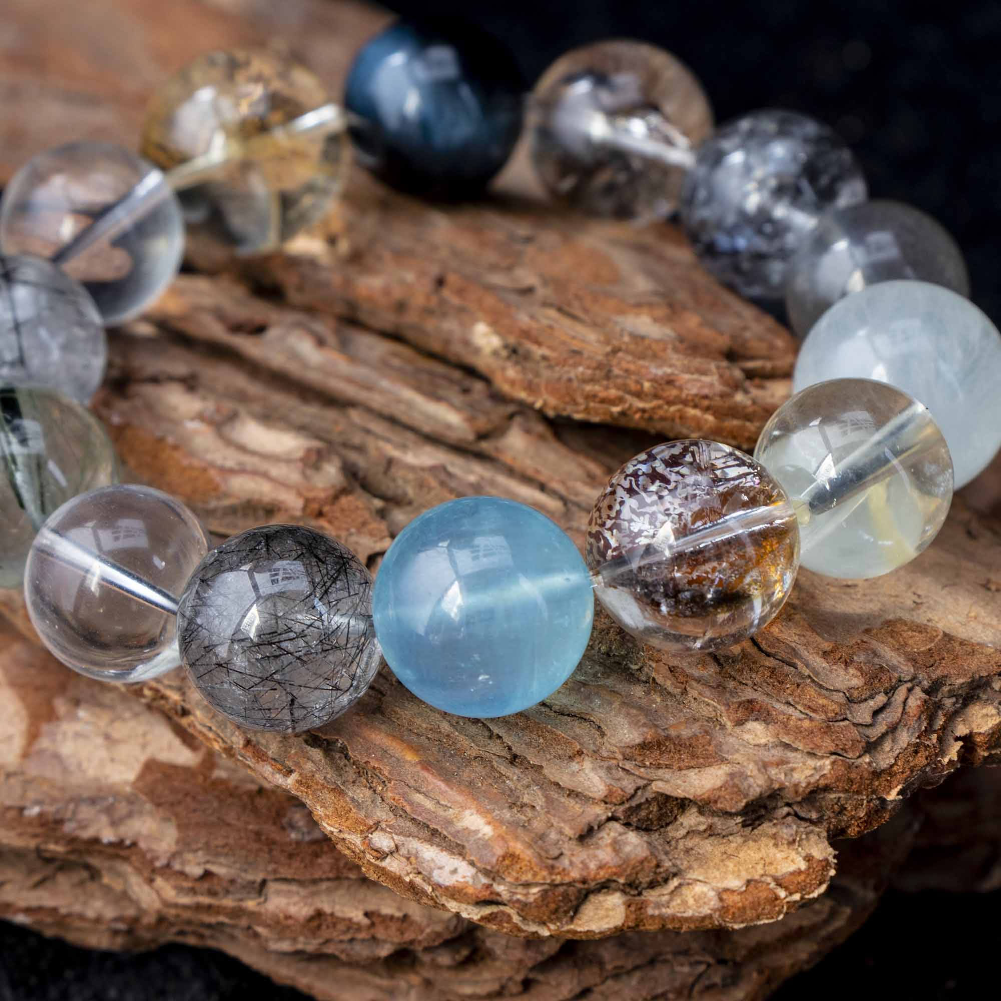 Auralyn Tarot The Chariot Growth & Flow Crystal Bracelet, 13–15mm Green & Black Rutilated Quartz with Clear Quartz, Gold-Foil Flower Agate, White Phantom, Aquamarine & Blue Tiger Eye, Handmade