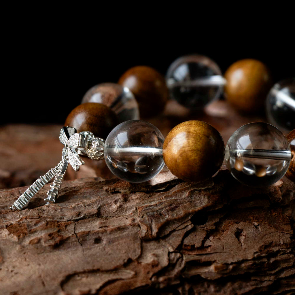 Auralyn Healing Butterfly Serenity Clear Quartz & Golden Phoebe Wood Bracelet, 16–17mm Natural Clear Quartz Beads with Silver-Plated Butterfly Charm, Handmade Mood-Healing Energy Jewelry for Clarity, Calm & Grounding