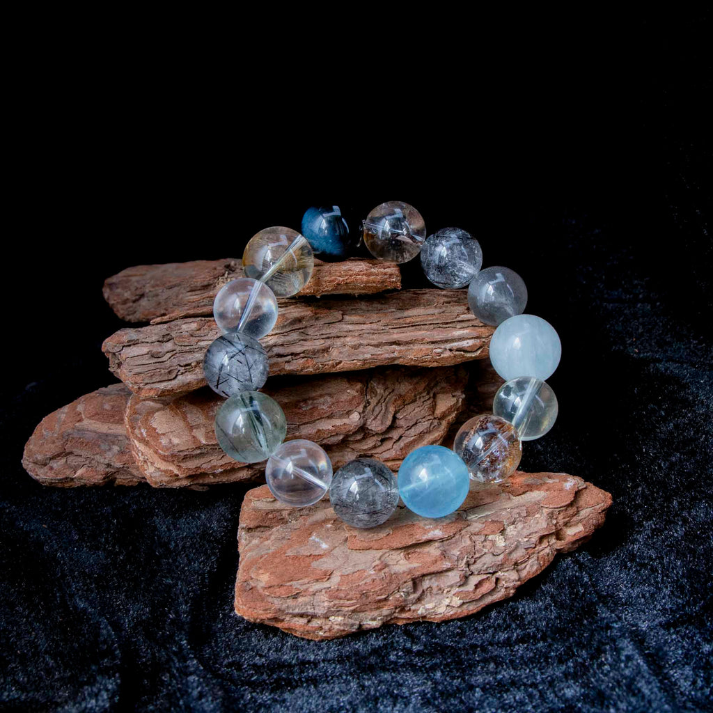 Auralyn Tarot The Chariot Growth & Flow Crystal Bracelet, 13–15mm Green & Black Rutilated Quartz with Clear Quartz, Gold-Foil Flower Agate, White Phantom, Aquamarine & Blue Tiger Eye, Handmade