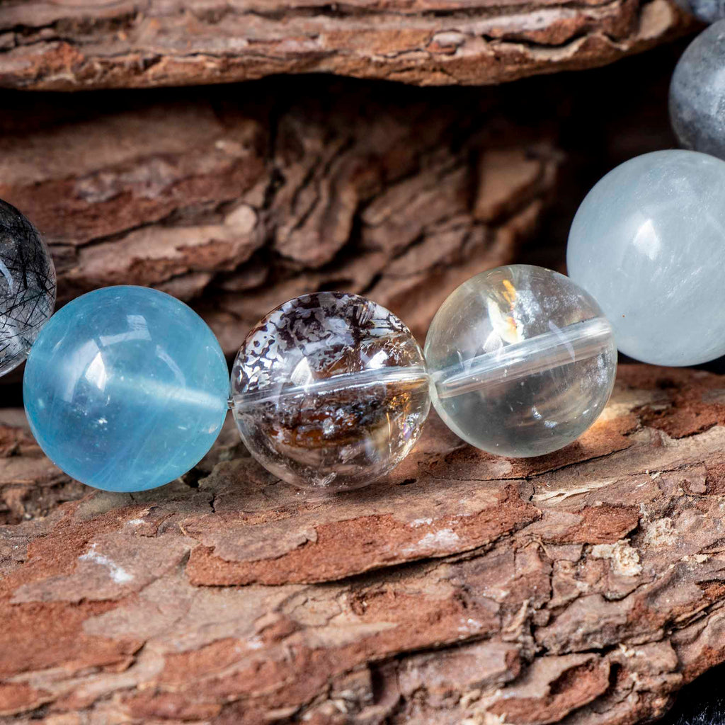 Auralyn Tarot The Chariot Growth & Flow Crystal Bracelet, 13–15mm Green & Black Rutilated Quartz with Clear Quartz, Gold-Foil Flower Agate, White Phantom, Aquamarine & Blue Tiger Eye, Handmade