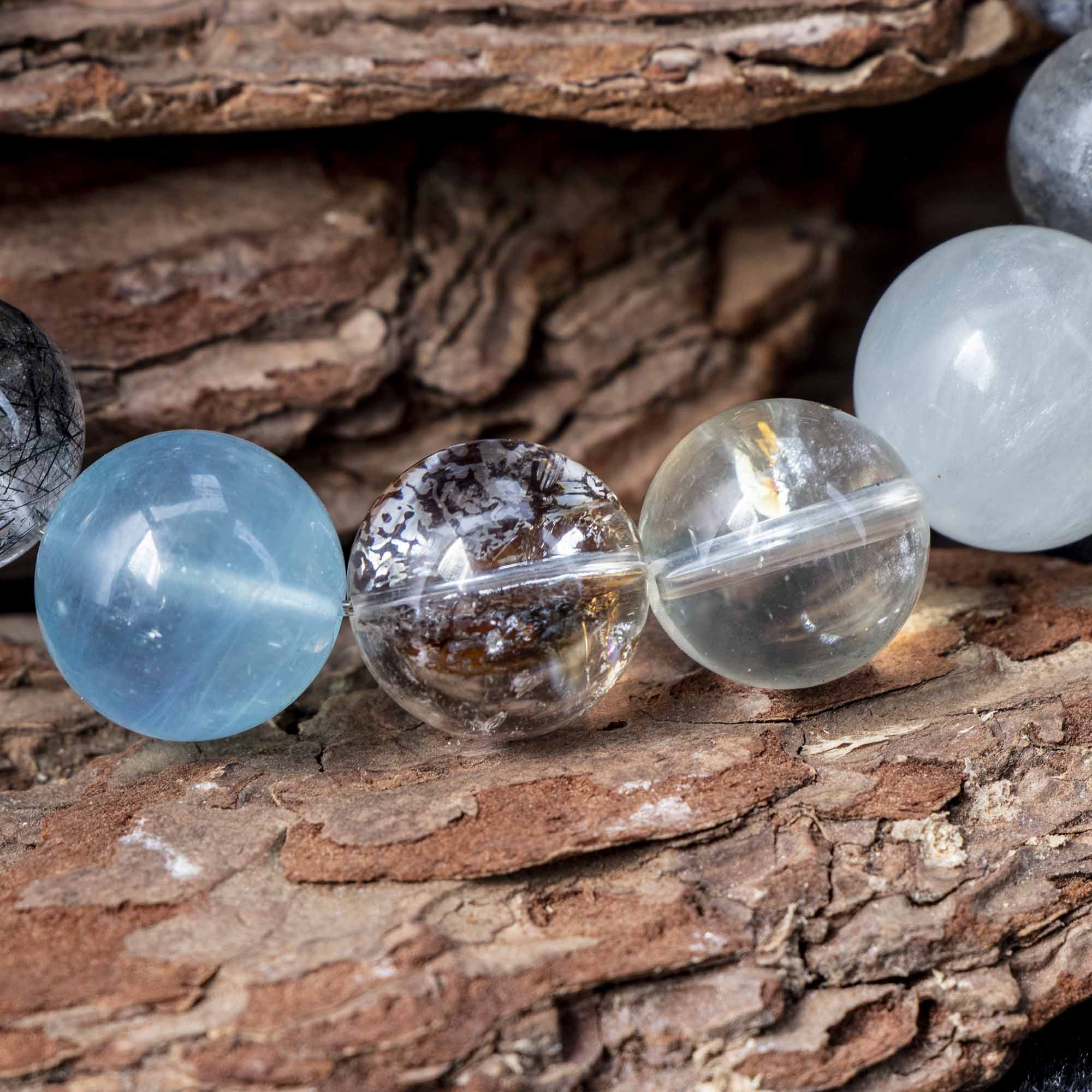 Auralyn Tarot The Chariot Growth & Flow Crystal Bracelet, 13–15mm Green & Black Rutilated Quartz with Clear Quartz, Gold-Foil Flower Agate, White Phantom, Aquamarine & Blue Tiger Eye, Handmade