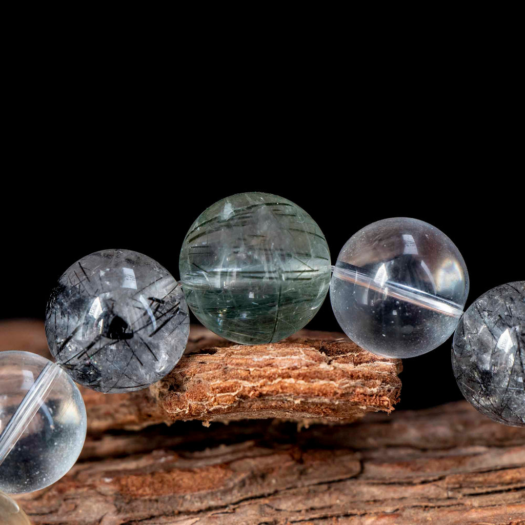 Auralyn Tarot The Chariot Growth & Flow Crystal Bracelet, 13–15mm Green & Black Rutilated Quartz with Clear Quartz, Gold-Foil Flower Agate, White Phantom, Aquamarine & Blue Tiger Eye, Handmade