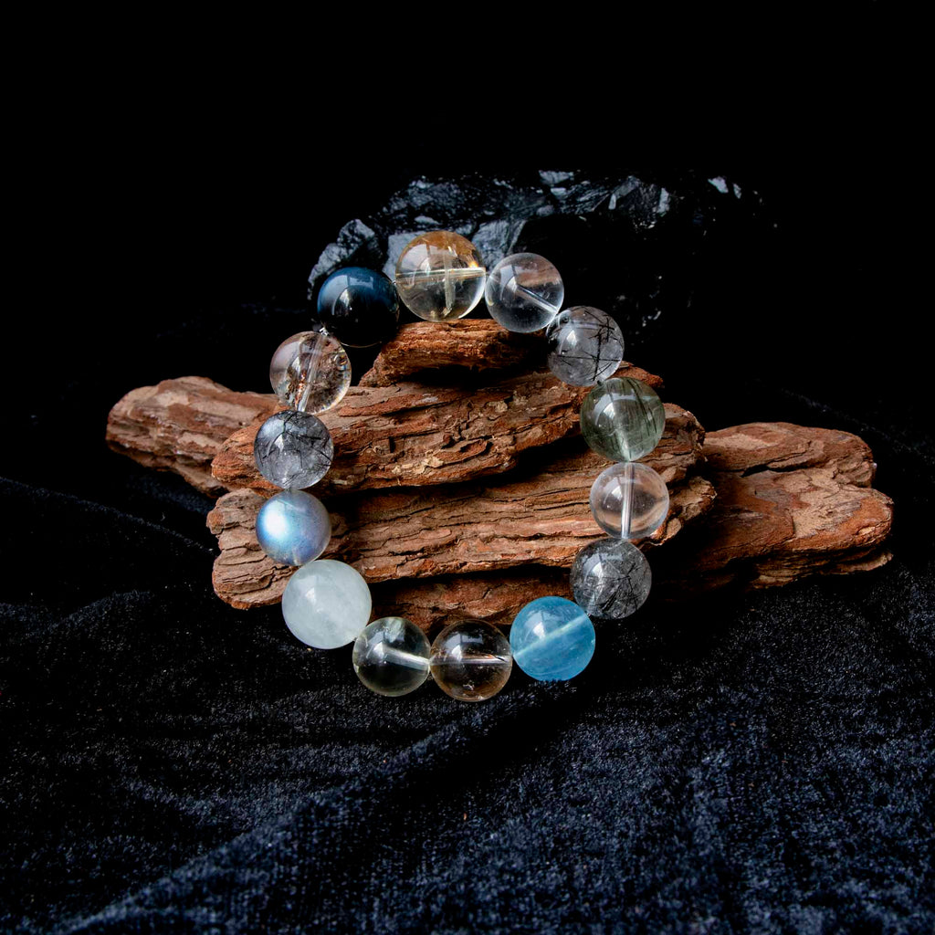 Auralyn Tarot The Chariot Growth & Flow Crystal Bracelet, 13–15mm Green & Black Rutilated Quartz with Clear Quartz, Gold-Foil Flower Agate, White Phantom, Aquamarine & Blue Tiger Eye, Handmade